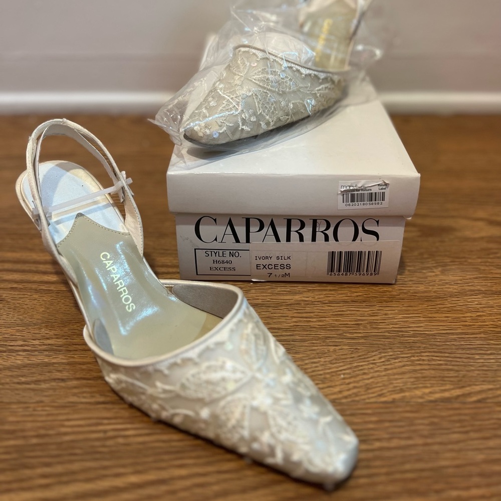Caparro’s Sequin Ivory Silk Slingback Heels
